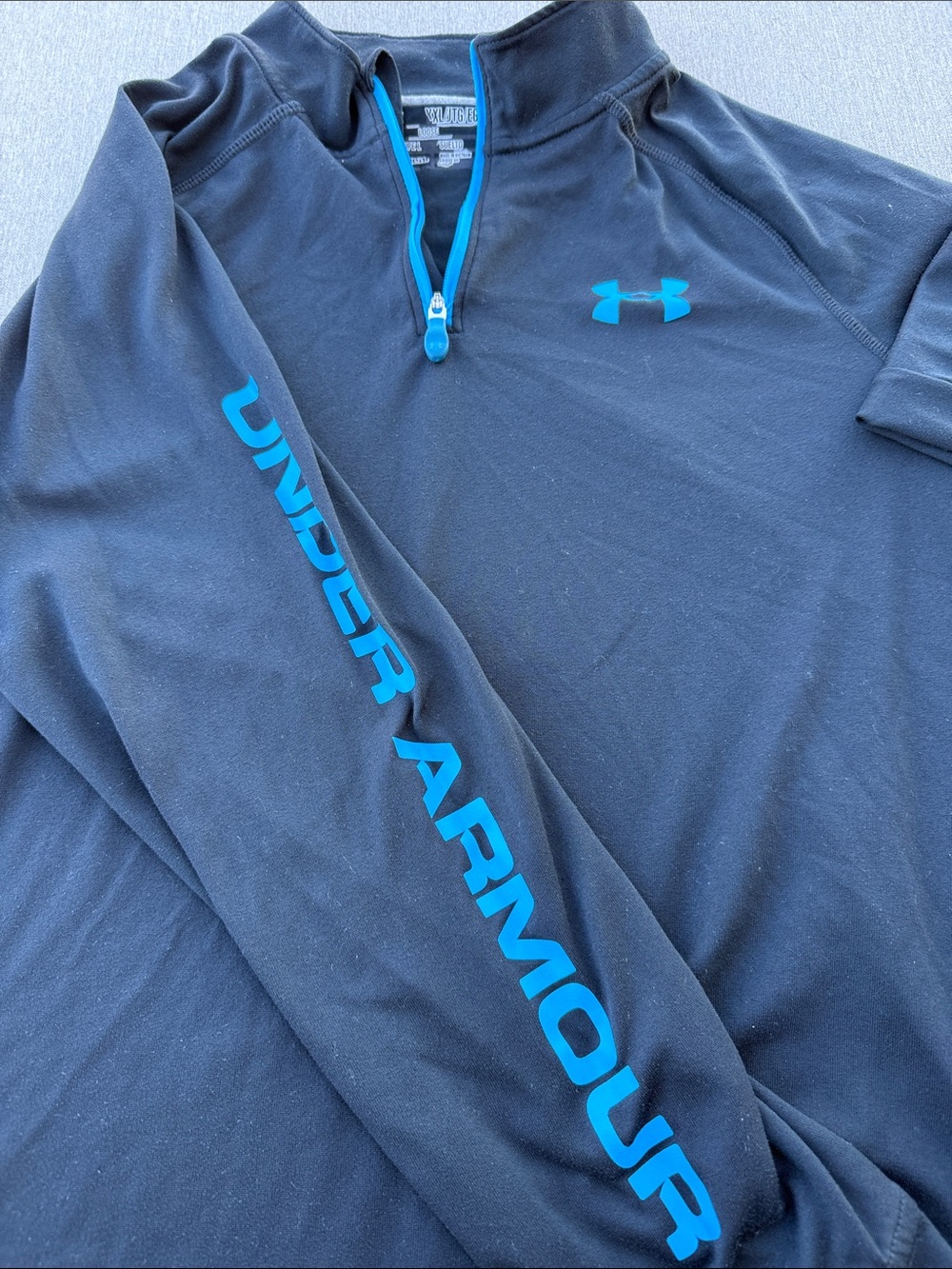 Under Armour Black Quarter-Zip Pullover with Teal Blue Logo and Sleeve Text